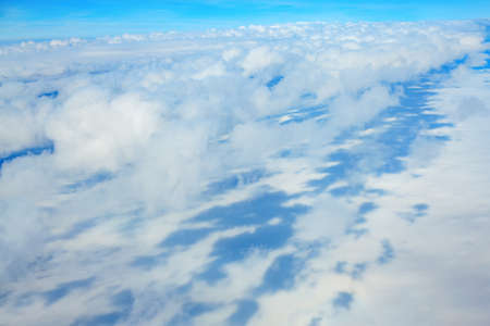 Flying over the Earth through the clouds