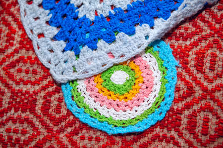 Colored wool rug . Traditional embroidery decoration