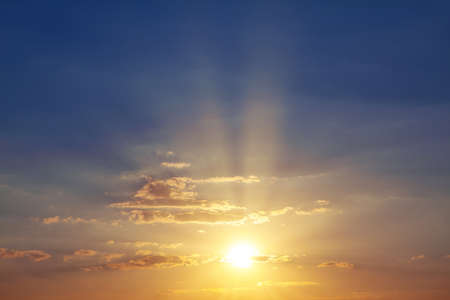 Sun dial with rays in the dusk