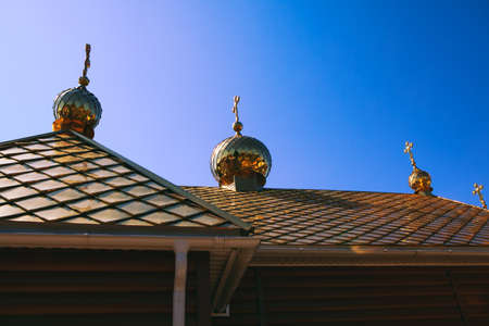 domes with crosses on the church roofの写真素材
