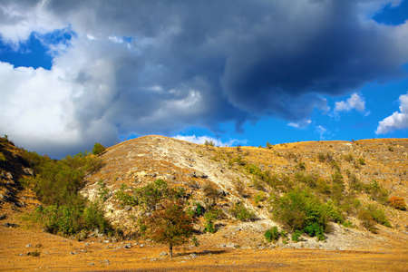 Low clouds over the hill . Rocky mount landscapeの写真素材