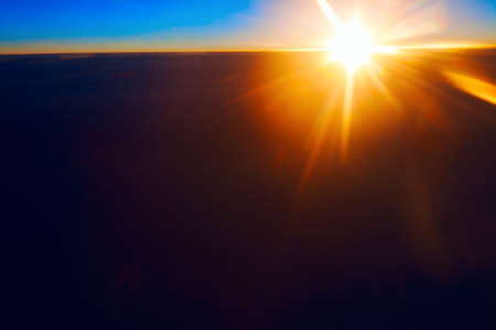 Sun above dark clouds . Fantastic sunlight view from a high heightの写真素材