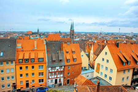 Nuremberg aerial cityscape , view of rooftops and St. Sebald church spire. Residential german...