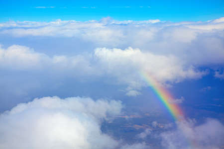Flying through the clouds and rainbow . Flight like dreamingの写真素材