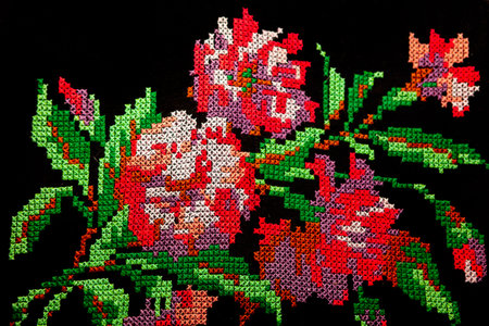 Floral pattern on the carpet . Traditional handmade embroidered rug .