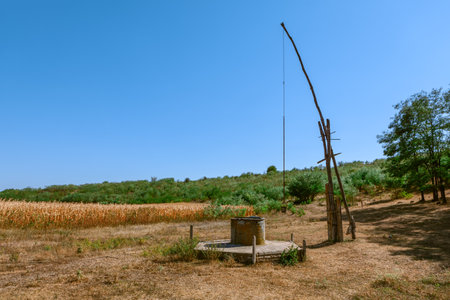 Ancient Well like in film . Old rustic water wellの写真素材