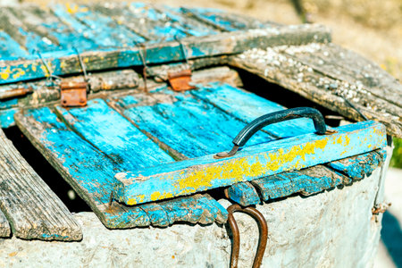 Wooden frame of well . Top wooden part of ancient water wellの写真素材
