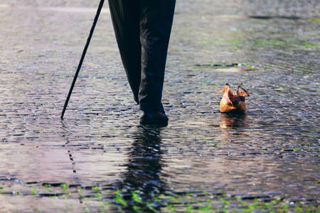 Black pants street performer . Actor plays a scene from a retro movieの写真素材
