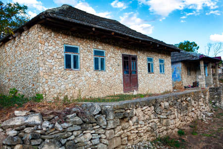 Rustic houses with rubble walls . Settlement of poor peopleの写真素材