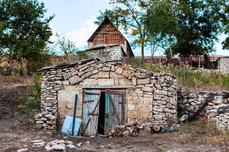 Archaic cellar in the country . Old building for keeping products undergroundの写真素材