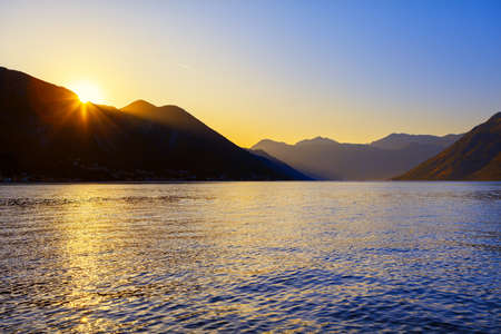 South Island is stunning coastal region . Sunset over the mountains and sea . Lagoon Surrounded by Mountainsの写真素材