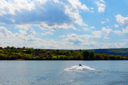 Jet ski in the river . Summer vacation