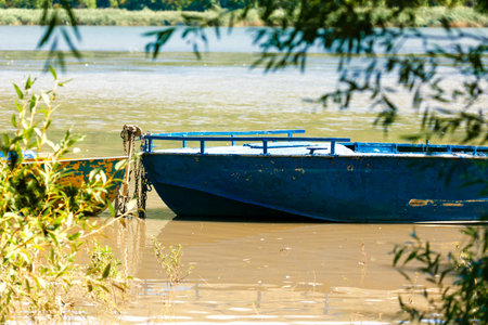 View of boats in the water . Rustic fishing .