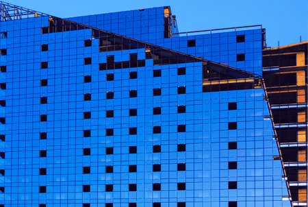 Blue architecture with modern windows . Sky reflection in the buildingのeditorial素材