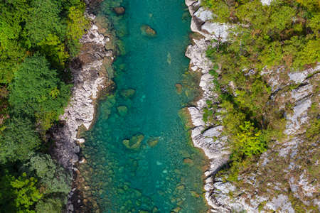Rapid river in canyon view from above . Aerial view of Tara river in Montenegro . Natural stones in transparent waterの写真素材