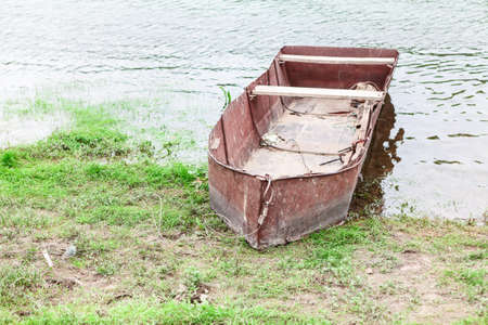 Old rusty boat for rustic fishingの写真素材