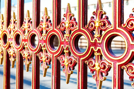 Iron fence in baroque style . Details of royal palace fenceのeditorial素材