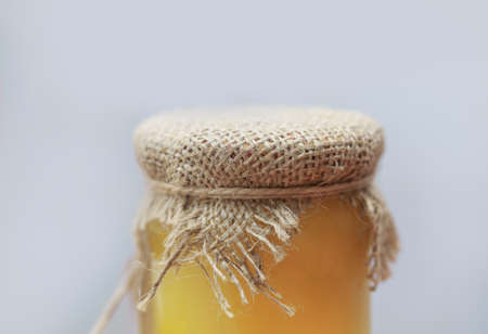 Organic Raw Acacia Honey in the Glass Jar