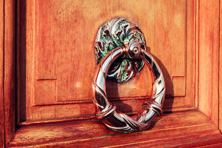 Church door handle. Cathedral entrance silver round handle
