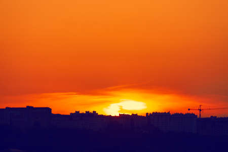Red city sky . Spectacular sunset over horizonの写真素材