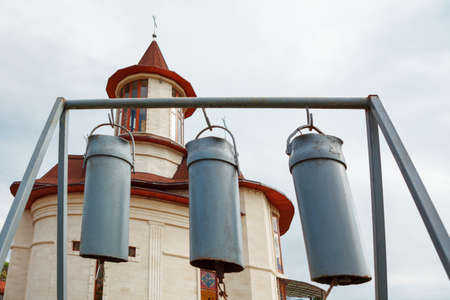 Bells in front of the church . Iron religious bellsの写真素材