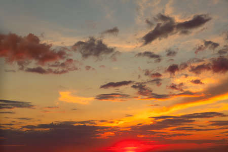 Rich colors sky with colorful clouds . Celestial twilight