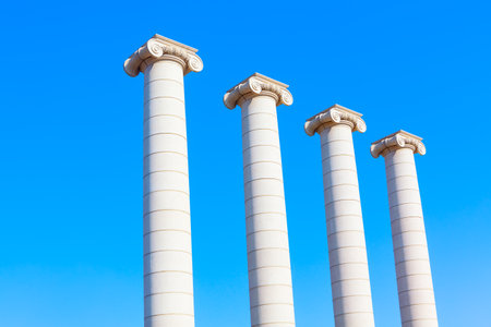 Greek Ionic Columns Against Blue Sky . Ancient architecture styleの写真素材