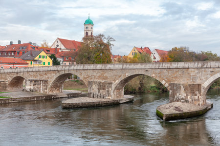 Bridge over Danube in Regensburg Germany . Medieval Arch bridge over the river . Steinerne Bruckeの写真素材