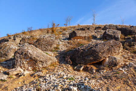Rocks on the hill . Landslide with rockfallの写真素材