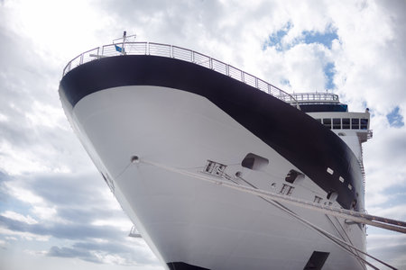 Rope moored ship . Cruise boat anchored in portの写真素材