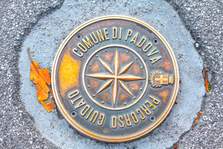 Sewer manhole in Padua Italy . City street sewerage with inscription Padova