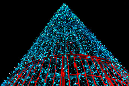 Artificial Christmas tree with garlandsの写真素材