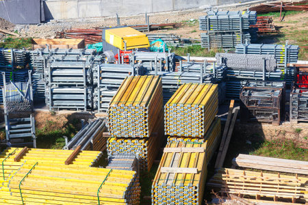 Pile of steel bars at a construction site. Industrial background.
