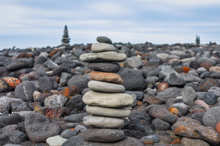 Stacked stones on the beach of La Palma, Canary Islands, Spainの写真素材
