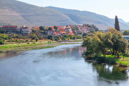 Landscape with river and houses in Bosnia Herzegovina , Europe . Trebinje riverside town in Balkansの写真素材