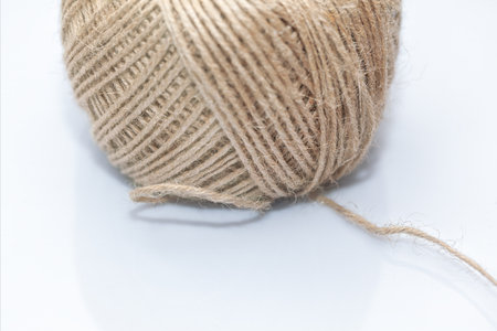 Skein of jute twine on a white background.