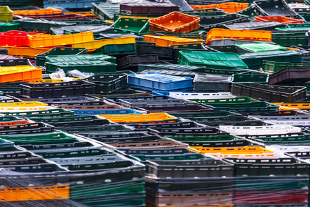 Colorful plastic containers for waste collection at the recycling plant in Germany