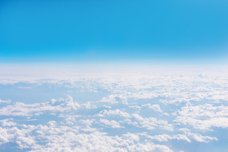 Breathtaking panorama of clouds, seen from a high altitude. Aerial view of cloudscapes, showcasing the earth's atmosphere.の写真素材