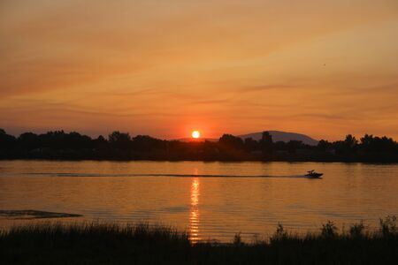 River Boat Sunsetの写真素材