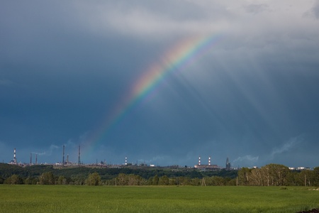 Industrial landscape and rainbowの写真素材