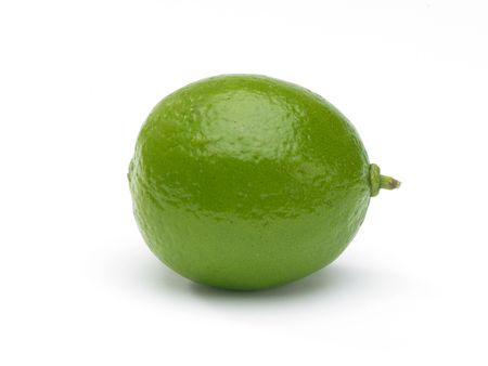 A single whole Lime on white background with drop shadow
