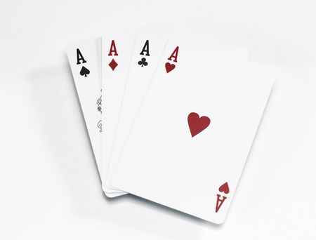 From a pack of playing cards four Ace cards on a white backgroundの写真素材