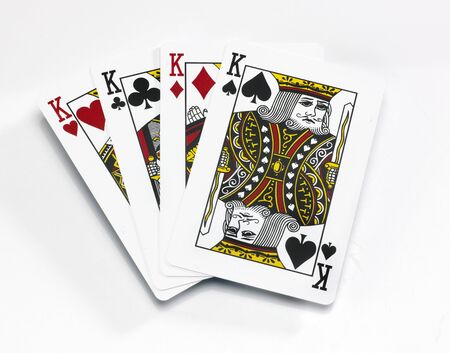 From a pack of playing cardsfour King cards on a white backgroundのeditorial素材