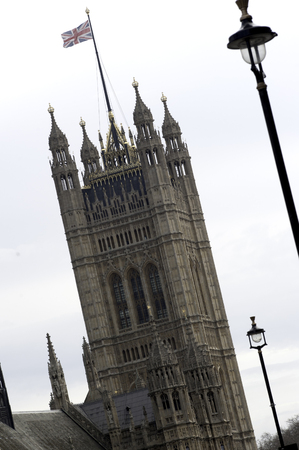 View of Victoria Tower in London with union Jack flag flyingの写真素材