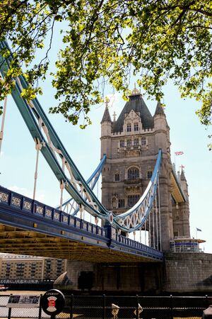 Tower Bridge in London with bridge lowered and blue sky
の写真素材