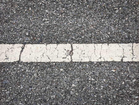 close-up black road surface. pattern of black road for used as background. Abstract close up texture black road.の写真素材