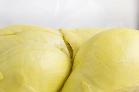 Close up of peeled durian. Close up of peeled durian flesh isolated on white background.