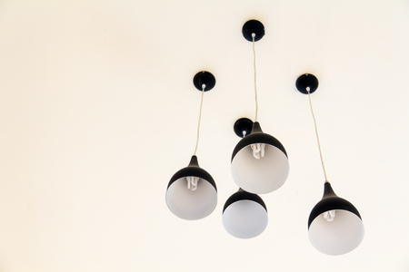 black lamp on the top wallの写真素材