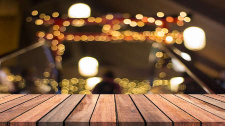 Abstract empty wooden floor with multicolored light. empty wood with bokeh light, for use as...