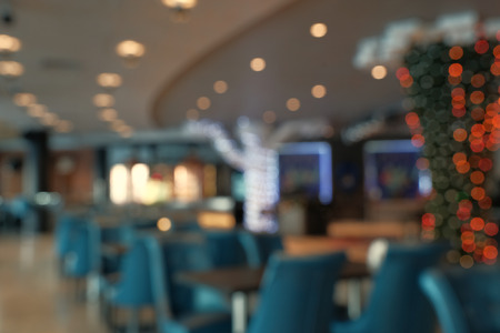 Abstract blur restaurant interior for background. Blur coffee shop or cafe restaurant with abstract bokeh image backgroundの写真素材